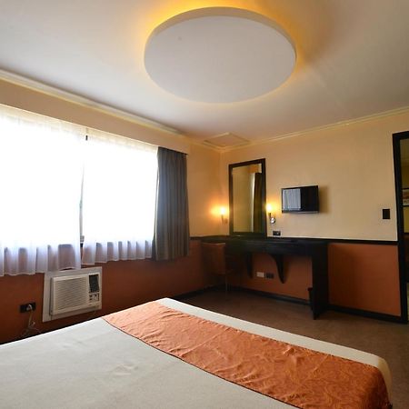 Fernandina 88 Suites Hotel Cidade Quezon Exterior foto