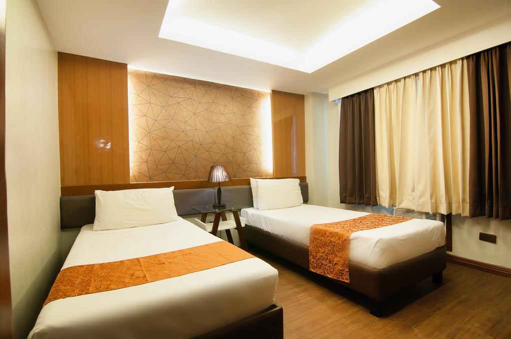 Fernandina 88 Suites Hotel Cidade Quezon Exterior foto